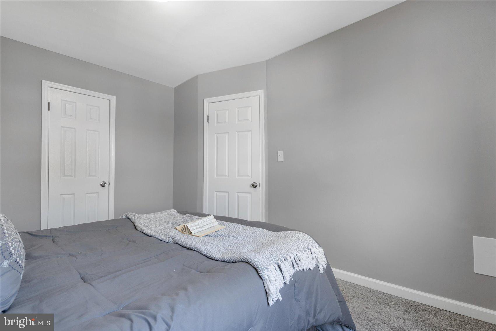 1932 Haselmere Road Dundalk, MD 21222 - Photo 20 of 40 a bedroom with a bed and a window