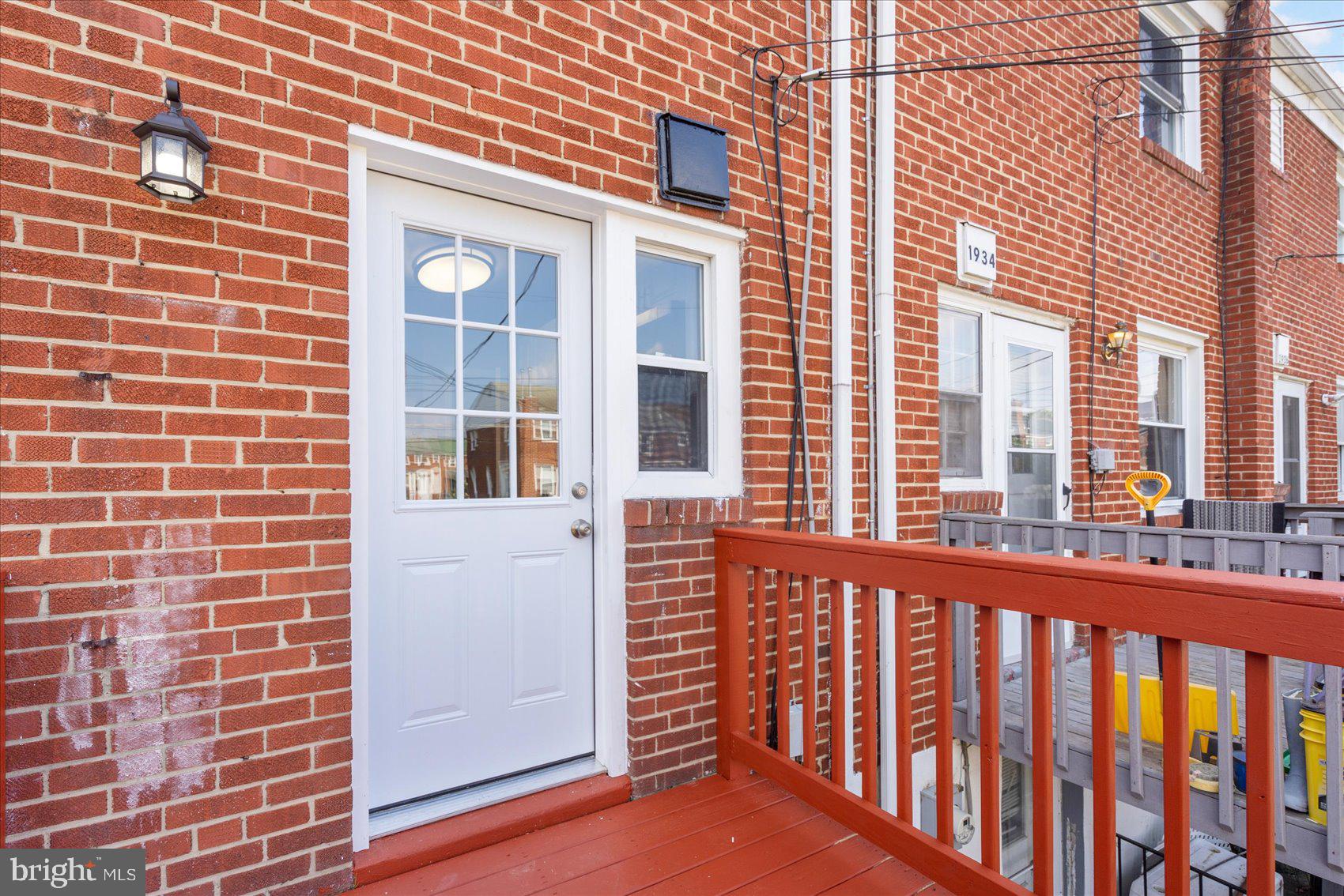 1932 Haselmere Road Dundalk, MD 21222 - Photo 33 of 40 a view of a brick building from a window