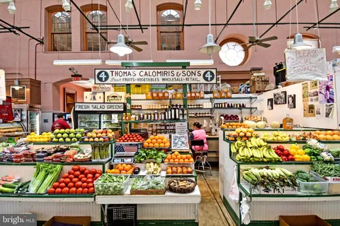 a grocery store filled with lots of fruit and vegetables