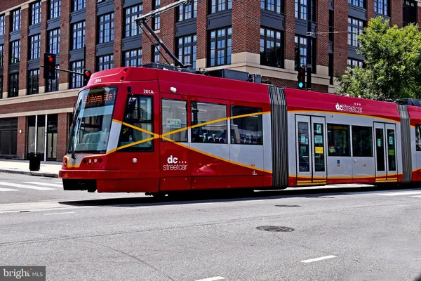 a front view of building with yard
