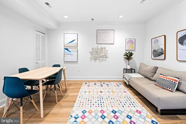 a living room with a couch and a table