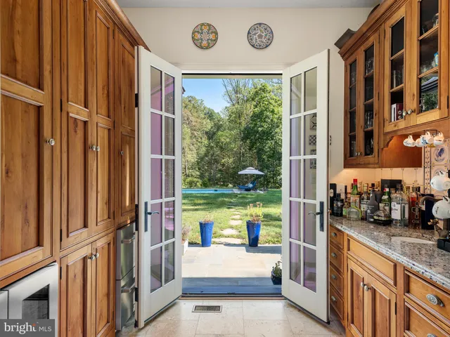 a view of staircase with black and white floor