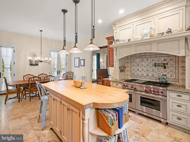 a bathroom with a toilet sink and window