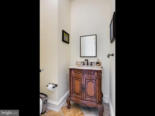 a view of a swimming pool with an outdoor space and seating area