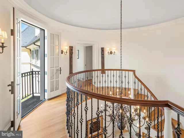 an aerial view of a houses with yard