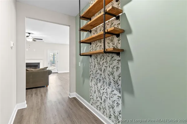 a view of a living room and utility room