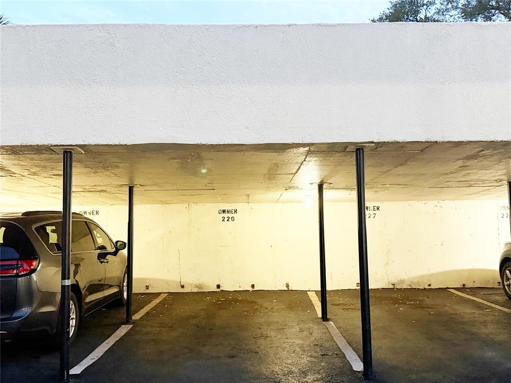 640 Northwest 13th Street, Unit 26 Boca Raton, FL 33486 - Photo 22 of 23 Covered assigned parking