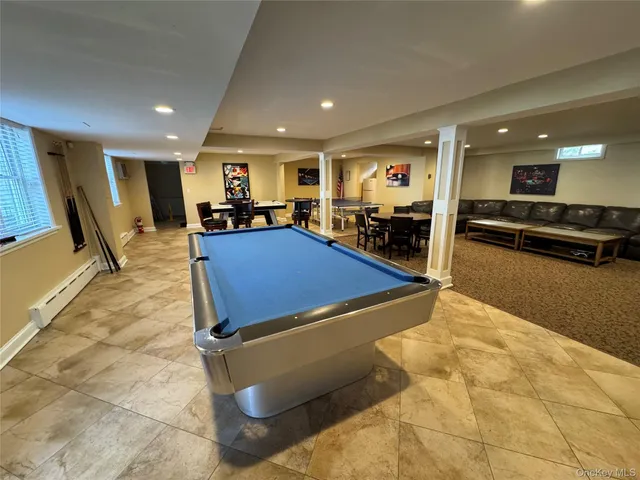 a large kitchen with stainless steel appliances lots of counter space