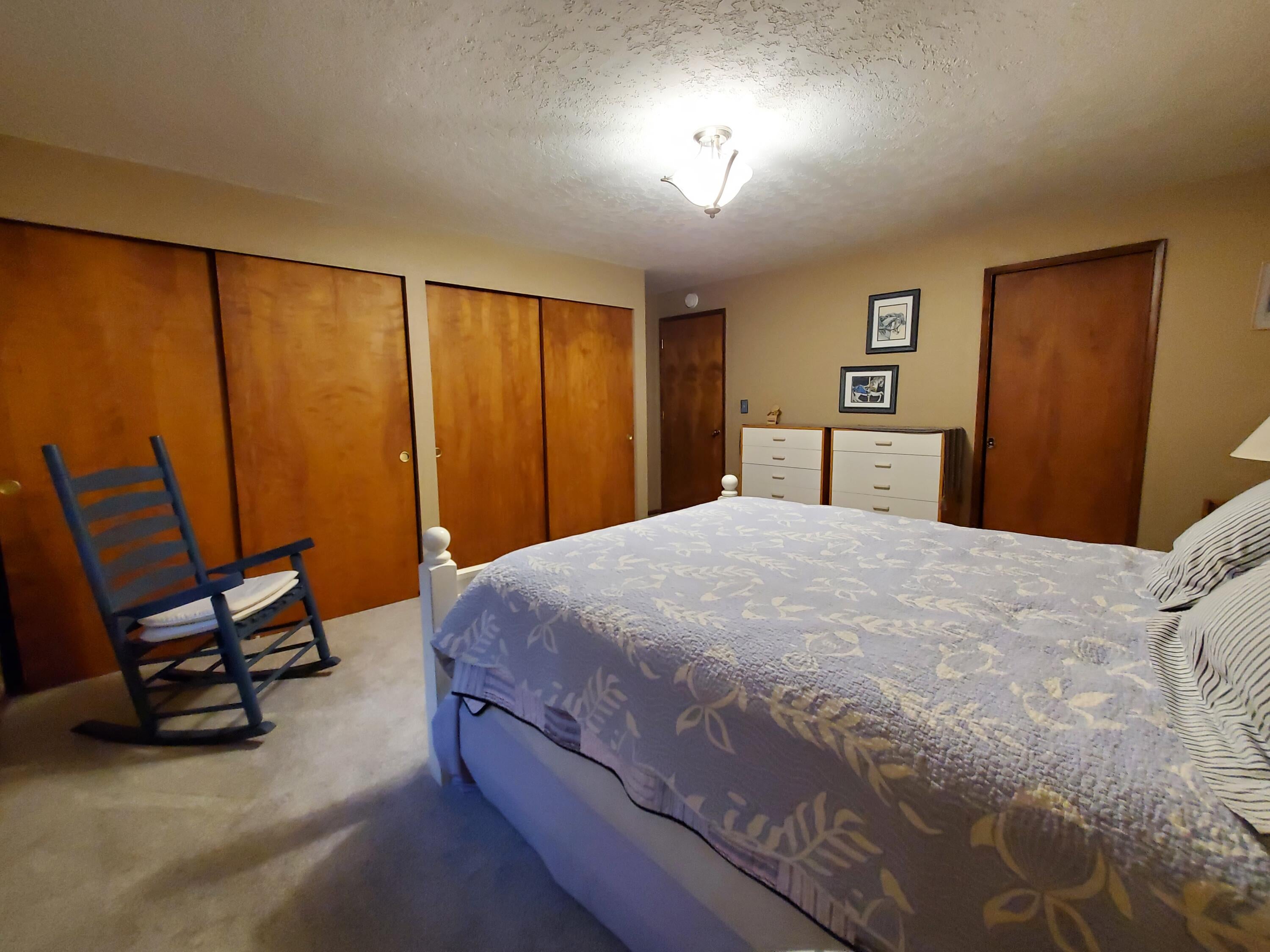 20397 Strawline Road Bend, OR 97702 - Photo 16 of 25 Primary bedroom has 2 large closets
