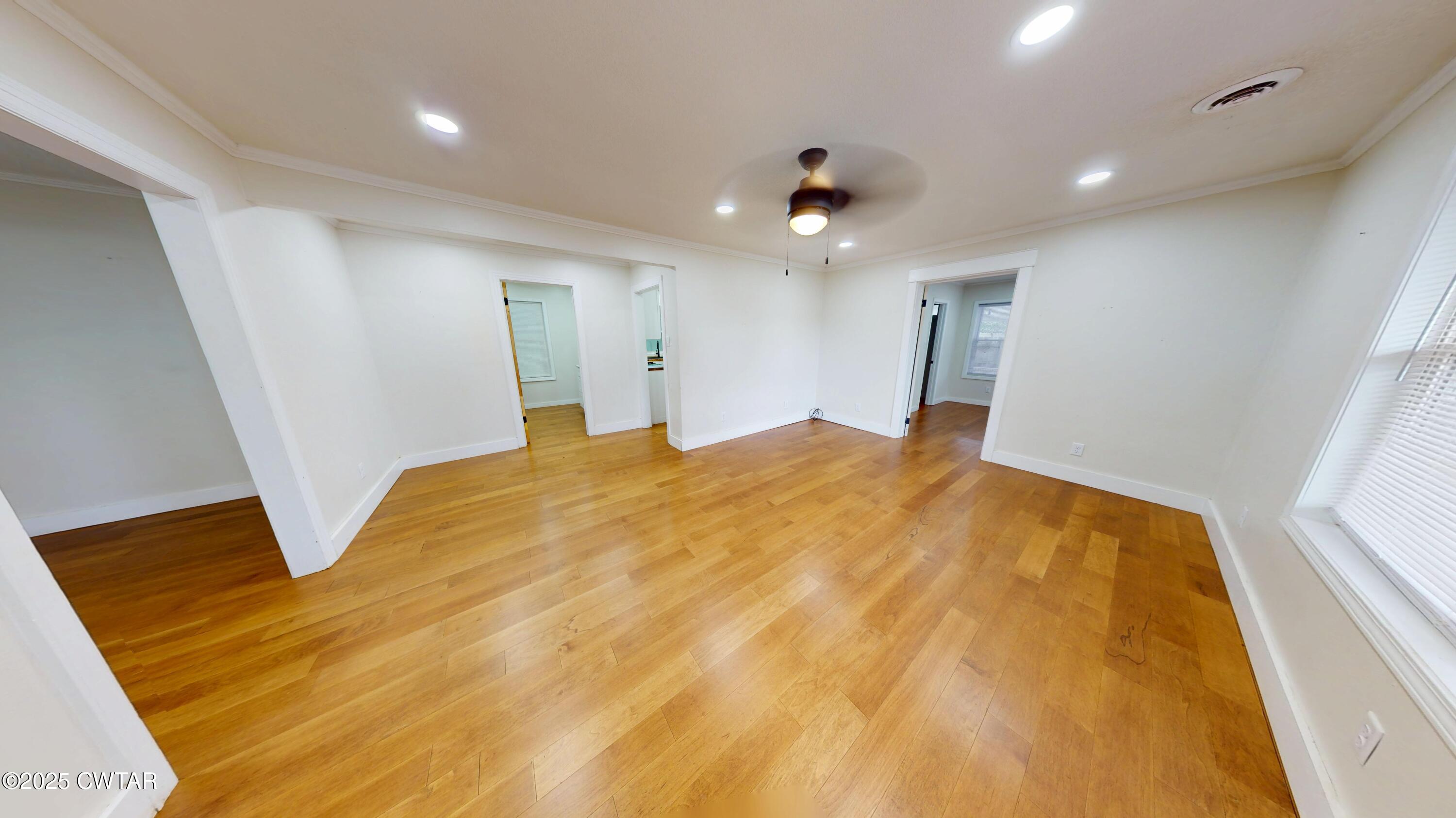 712 West Main Street Newbern, TN 38059 - Photo 2 of 27 a large white bed in a room
