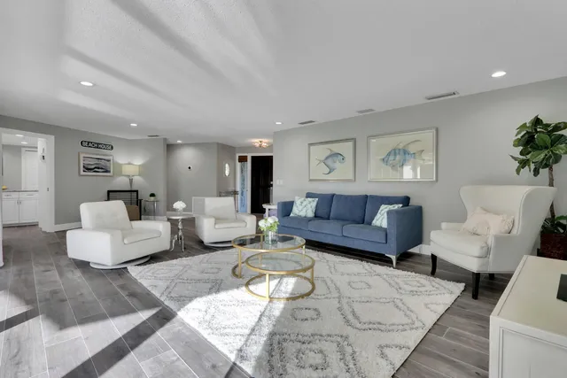 a living room with furniture and a couch