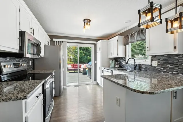 $345,000 | 608 Johnston Parkway, Raymore, MO 64083