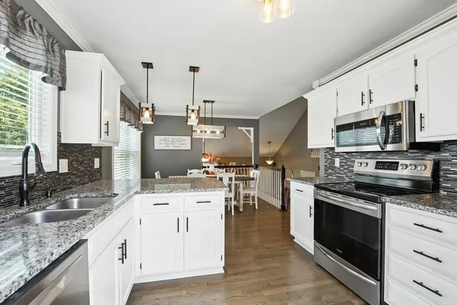 $345,000 | 608 Johnston Parkway, Raymore, MO 64083