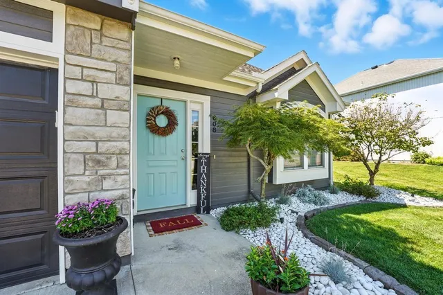 $345,000 | 608 Johnston Parkway, Raymore, MO 64083