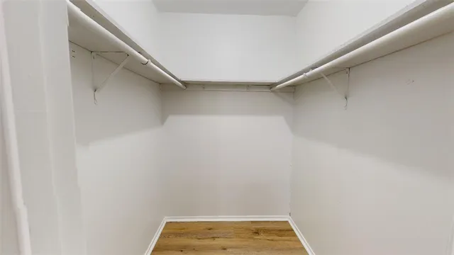 a bathroom with a tub and shower