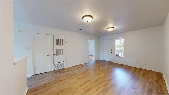 a kitchen with a sink a stove and refrigerator