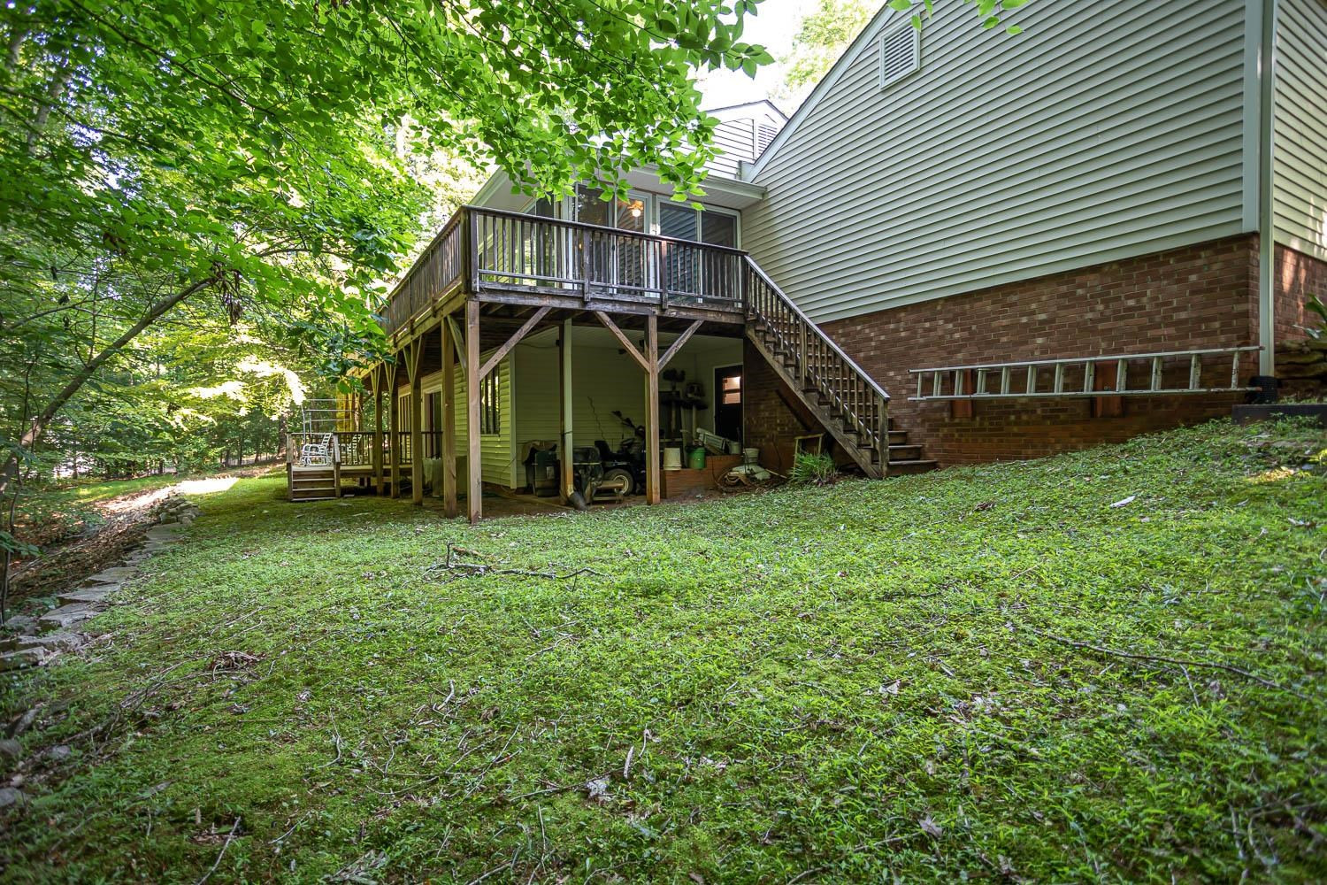 14401 Possum Track Road Raleigh, NC 27614 - Photo 20 of 30 Rear of home with 2 decks and a covered patio! Exterior Back