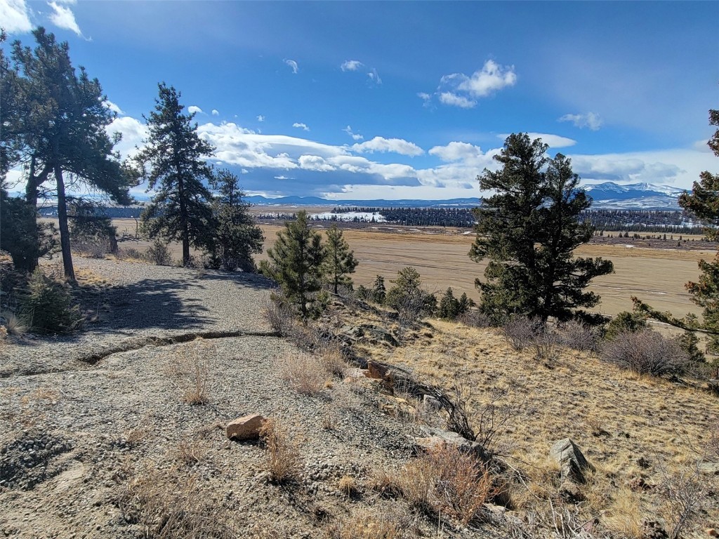 391 Bonell Drive Fairplay, CO 80440 - Photo 20 of 24 a view of a lake with a beach