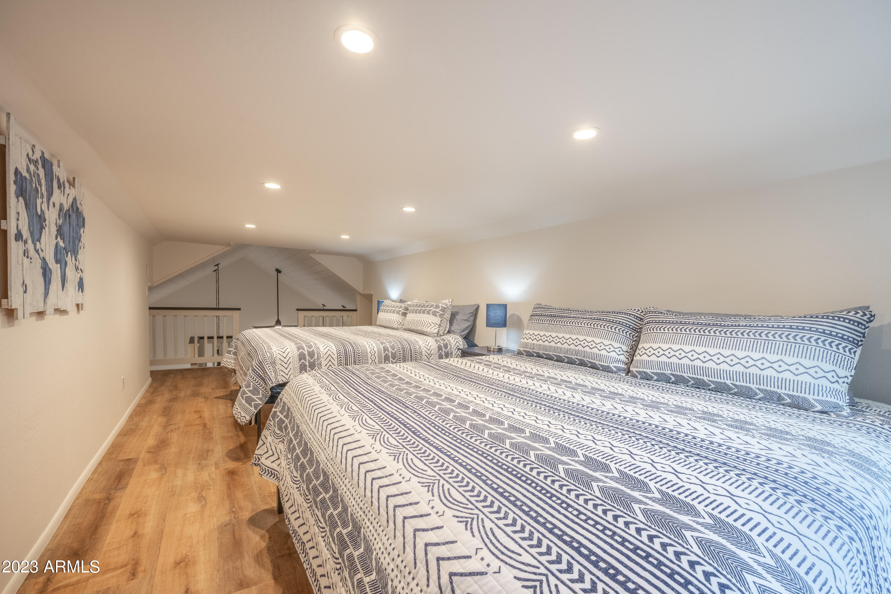 2772 Larson Loop Forest Lakes, AZ 85931 - Photo 39 of 65 a bed room with a bed and a night stand