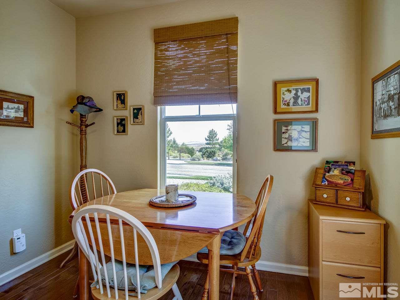 1100 Meridian Ranch Drive Reno, NV 89523 - Photo 13 of 25 a view of a dining room with furniture window and outside view