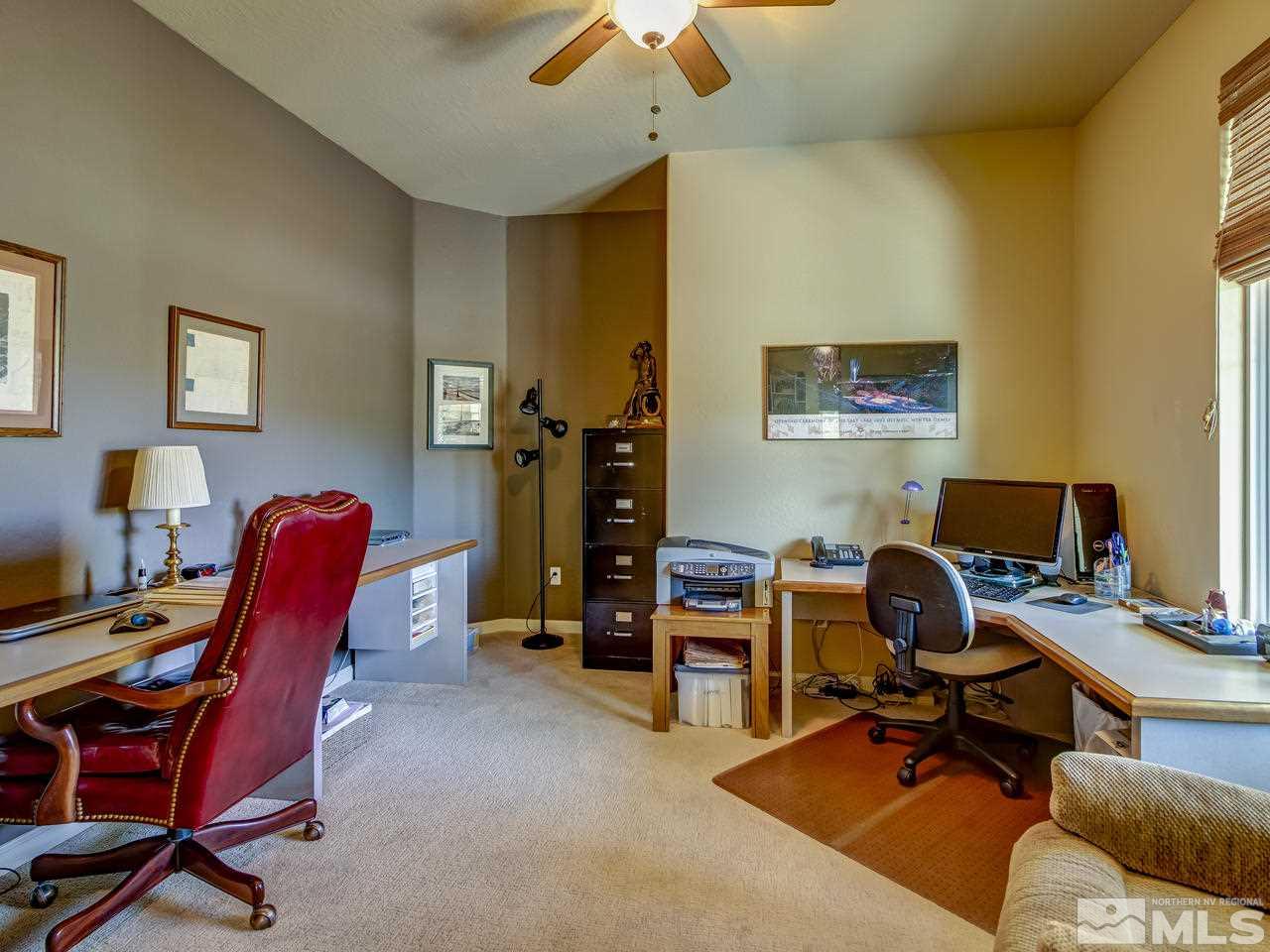 1100 Meridian Ranch Drive Reno, NV 89523 - Photo 22 of 25 a view of a workspace with furniture and a window