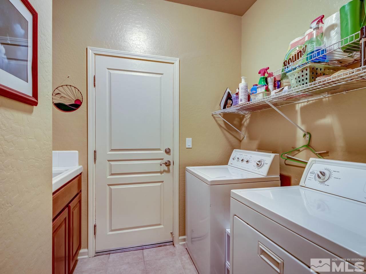 1100 Meridian Ranch Drive Reno, NV 89523 - Photo 23 of 25 a utility room with dryer and washer