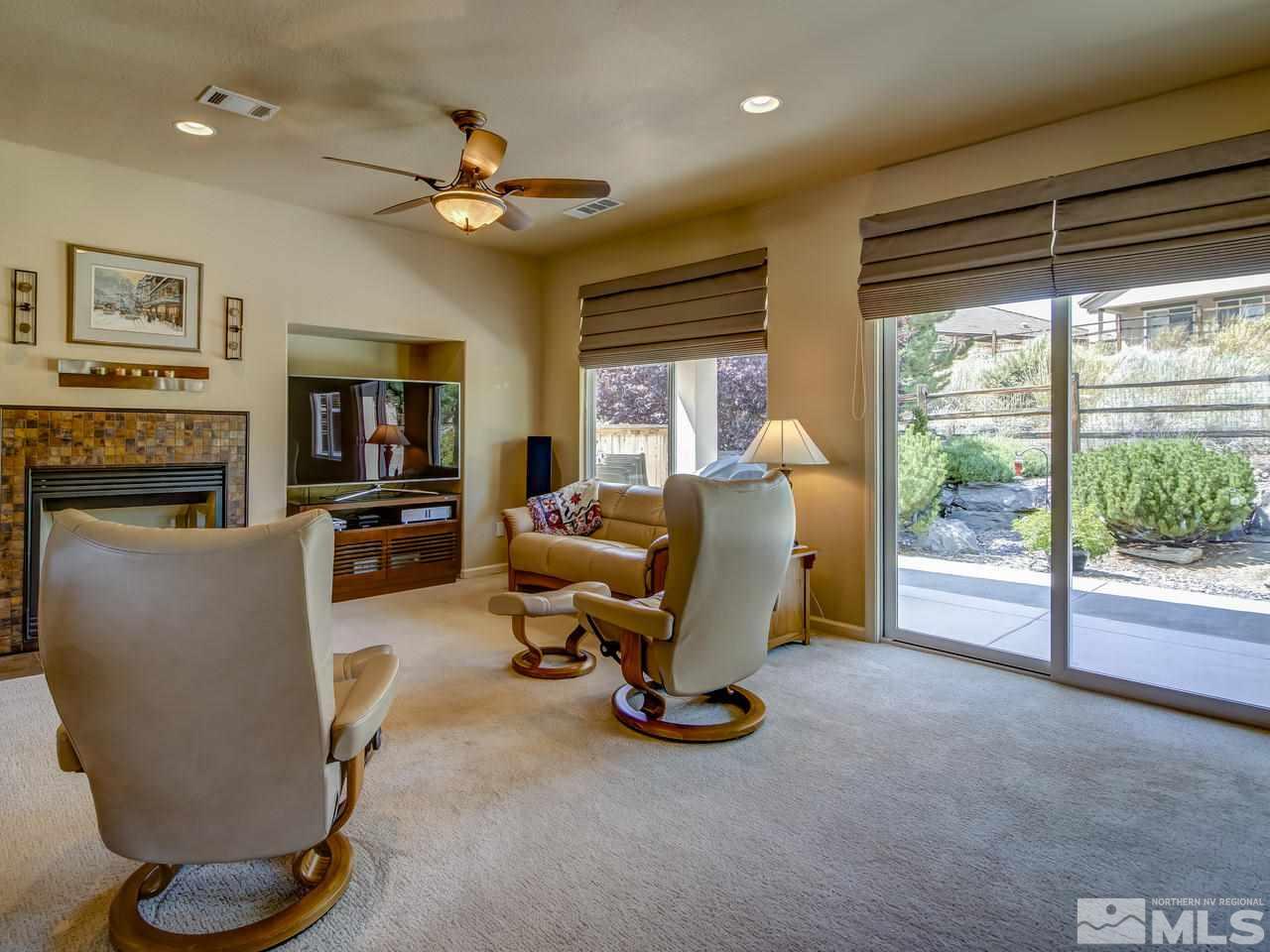 1100 Meridian Ranch Drive Reno, NV 89523 - Photo 5 of 25 a view of a livingroom with workspace and a window