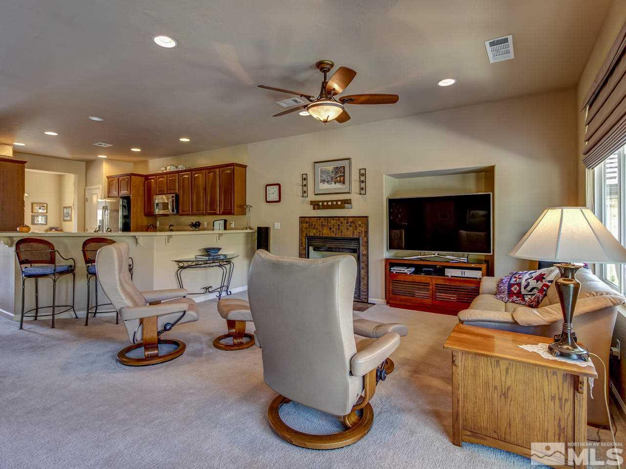 1100 Meridian Ranch Drive Reno, NV 89523 - Photo 7 of 25 a view of a livingroom with furniture and a flat screen tv