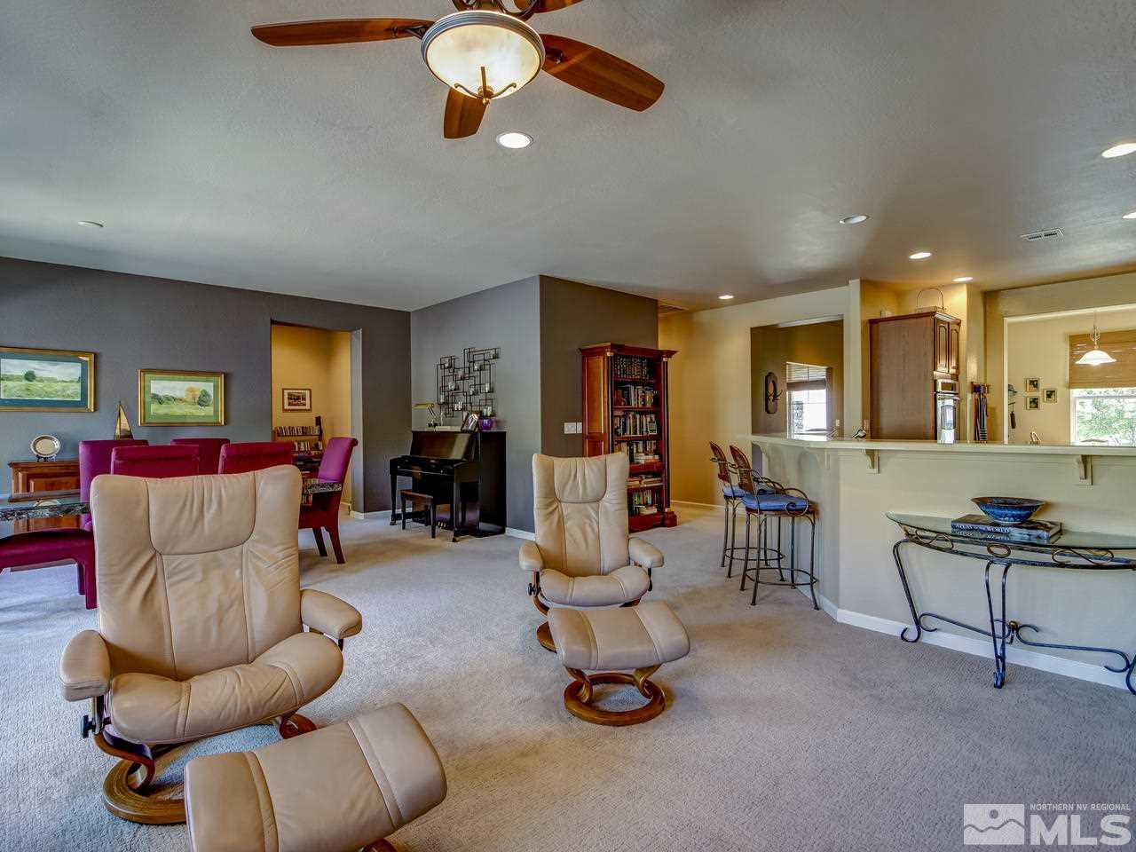 1100 Meridian Ranch Drive Reno, NV 89523 - Photo 8 of 25 a living room with furniture and a large window