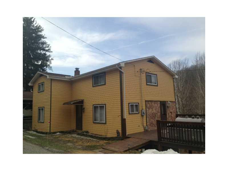 Exterior Front. REAL COUNTRY LIVING - Charming Cape-Cod located in Sycamore area on 2 1/2 acres of property.