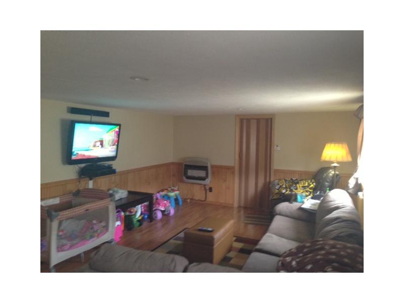 Living Room. Spacious living room with newer laminate flooring