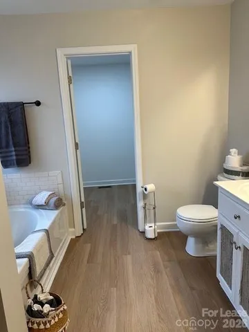 a bathroom with a sink and a toilet