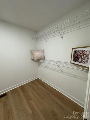 a view of a room with racks on the wall