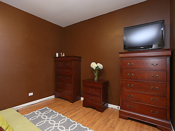 737 Shepard Court Gurnee, IL 60031 - Photo 15 of 18 a room with a bed and a television