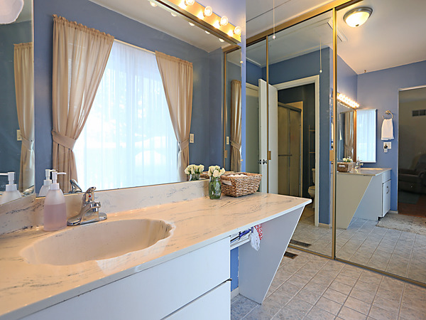 737 Shepard Court Gurnee, IL 60031 - Photo 16 of 18 a bathroom with a granite countertop sink and a mirror
