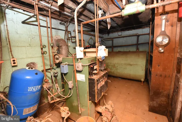 a front view of house with a garden