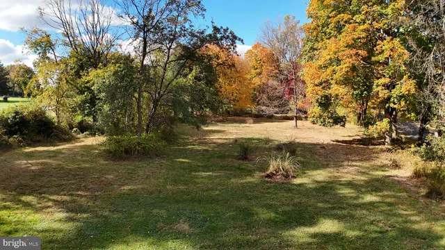a backyard of a house with entertaining space