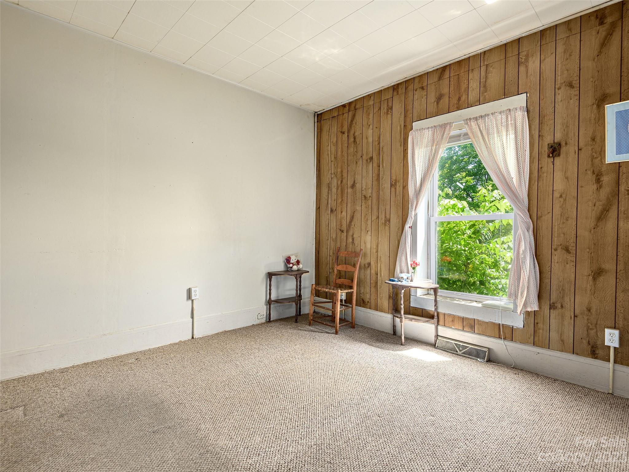 118 North Canton Road Canton, NC 28716 - Photo 11 of 17 an empty room with windows