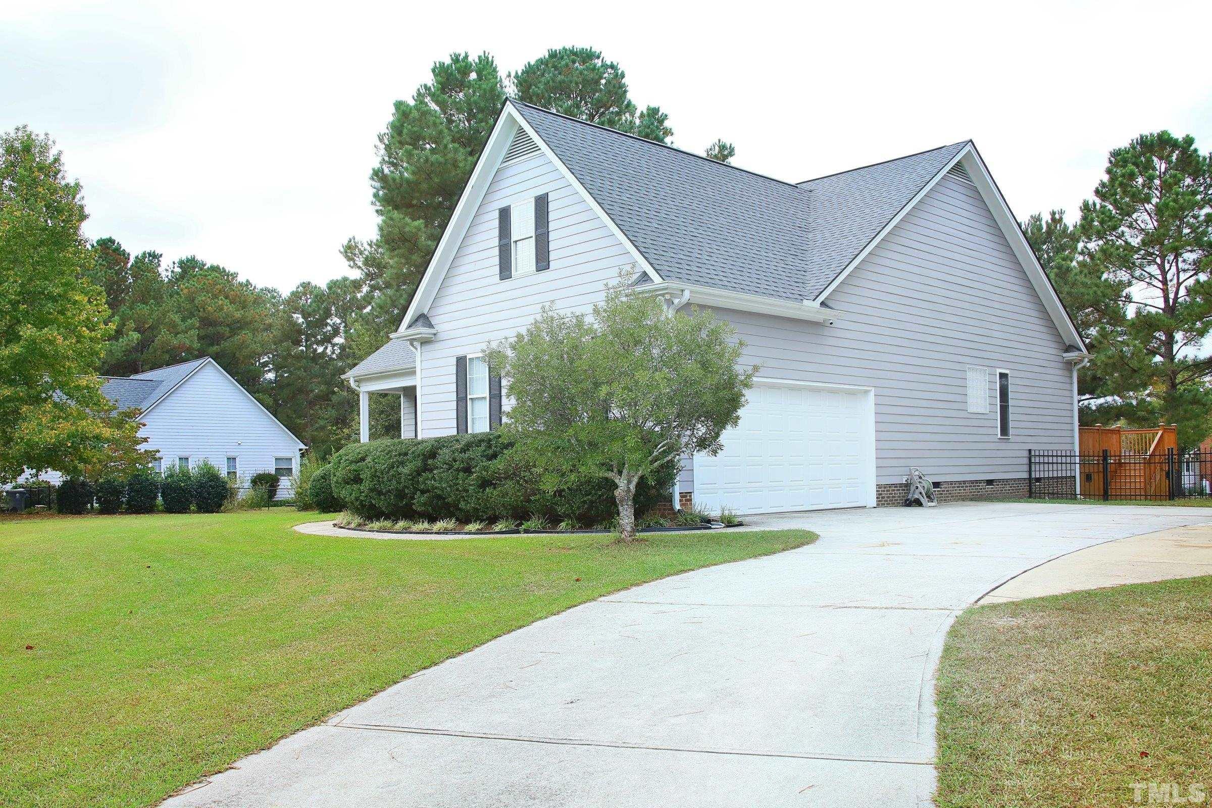 1013 Portico Place Raleigh, NC 27603 - Photo 2 of 27 SIDE ENTRY 2 CAR GARAGE AND EXTRA PARKING IN DRIVEWAY