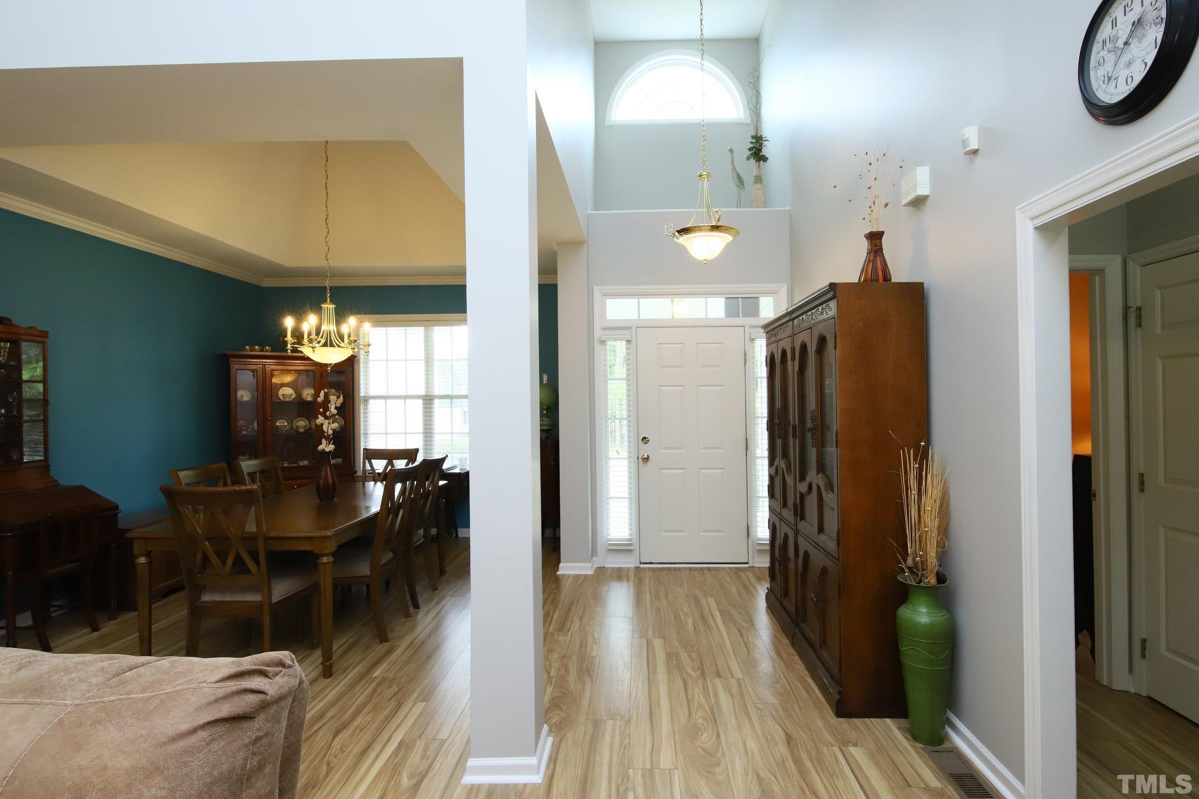 1013 Portico Place Raleigh, NC 27603 - Photo 5 of 27 BEAUTIFUL & WELCOMING FOYER WITH HIGH CEILINGS!