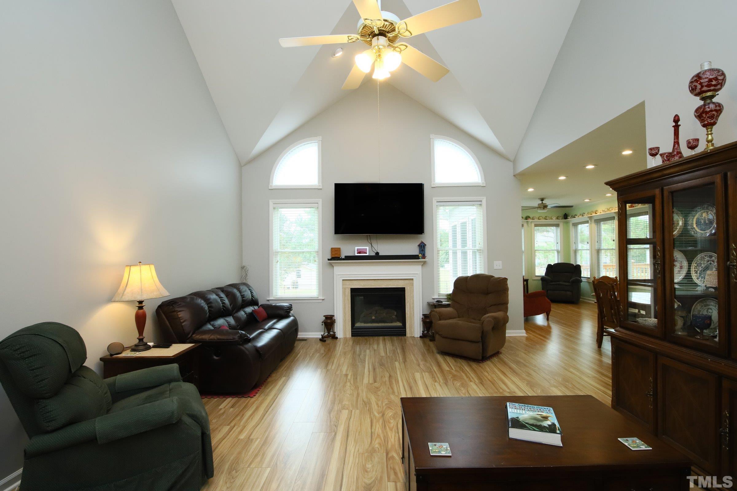 1013 Portico Place Raleigh, NC 27603 - Photo 7 of 27 VAULTED CEILING IN LIVING ROOM - MAKES THE SPACE LIGHT AND BRIGHT