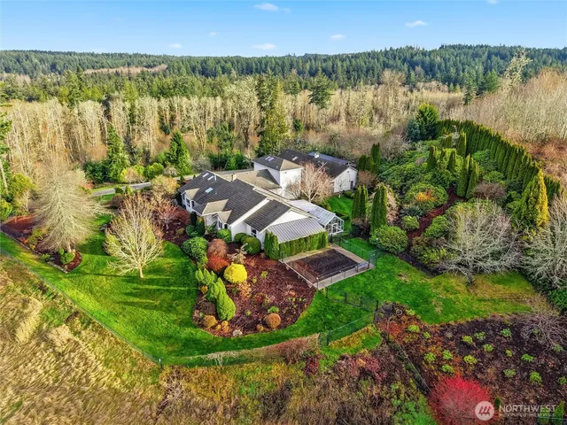 a view of a lake with a yard