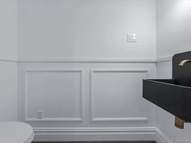 a bathroom with a shower and toilet