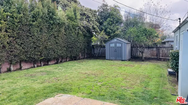 a house with a tree in front of it