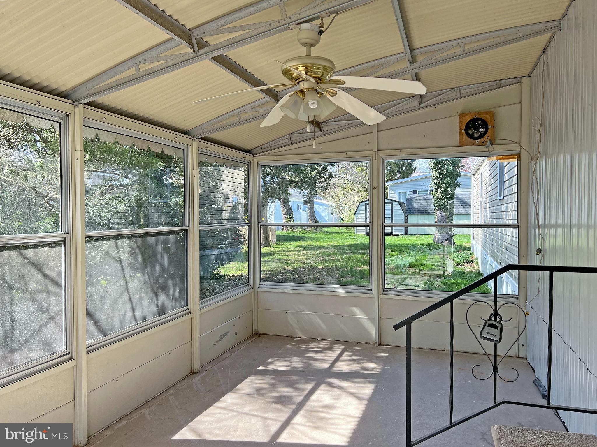 33943 Cedar Road, Unit 87 Lewes, DE 19958 - Photo 24 of 26 Left Screened Porch