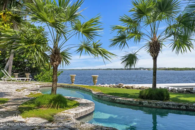 a view of a chairs and table in a patio