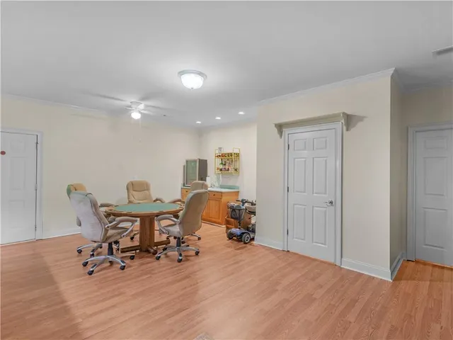 a workspace with furniture and wooden floor