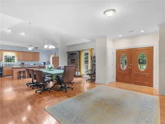 a view of a living room and dining room