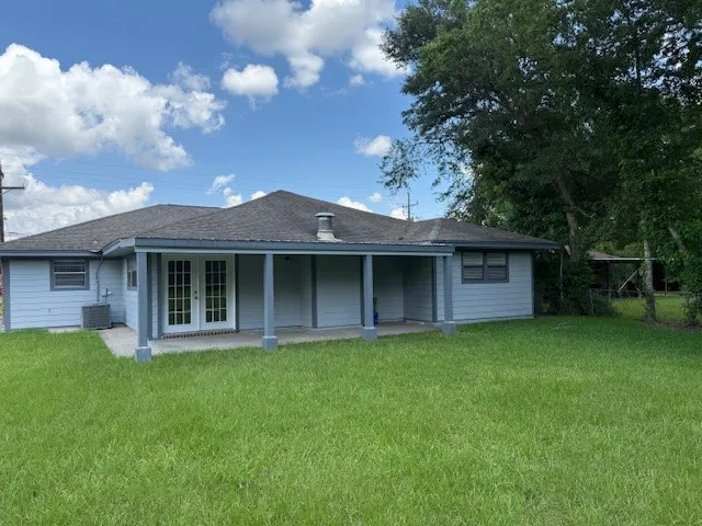 a view of a house with a garden