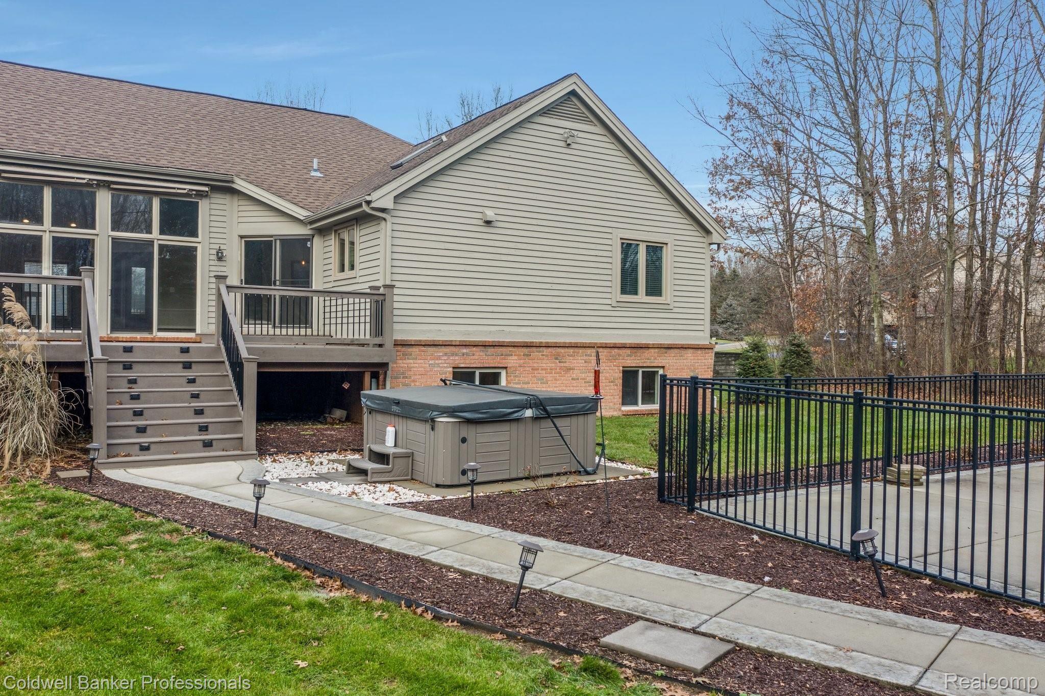 5365 Ridge Trail North Clarkston, MI 48348 - Photo 46 of 55 2018 - new patio and hot tub